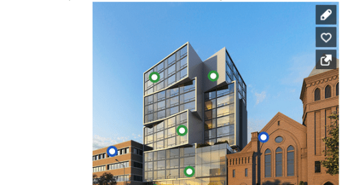 three buildings on a city street